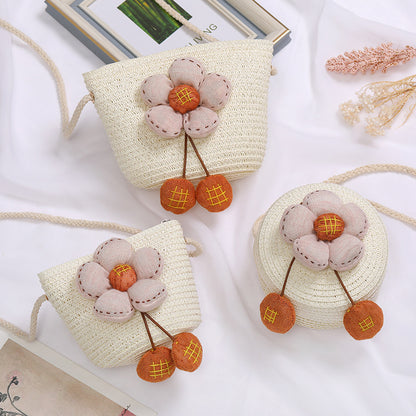 Petits sacs à bandoulière mignons en paille tissée à petites fleurs