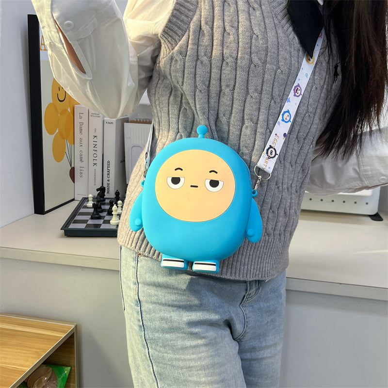 Poupée d'oeuf de dessin animé pour enfants en silicone mignon rangement porte-monnaie pour enfants